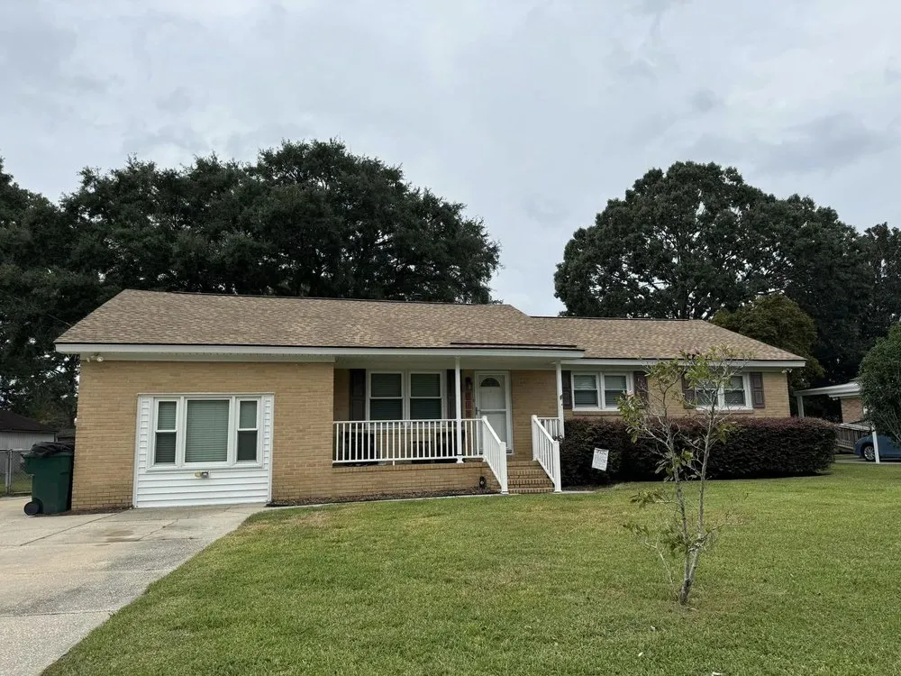 Slide of Woody's Roofing