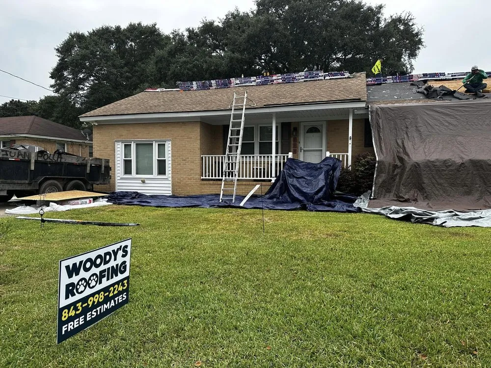 Slide of Woody's Roofing