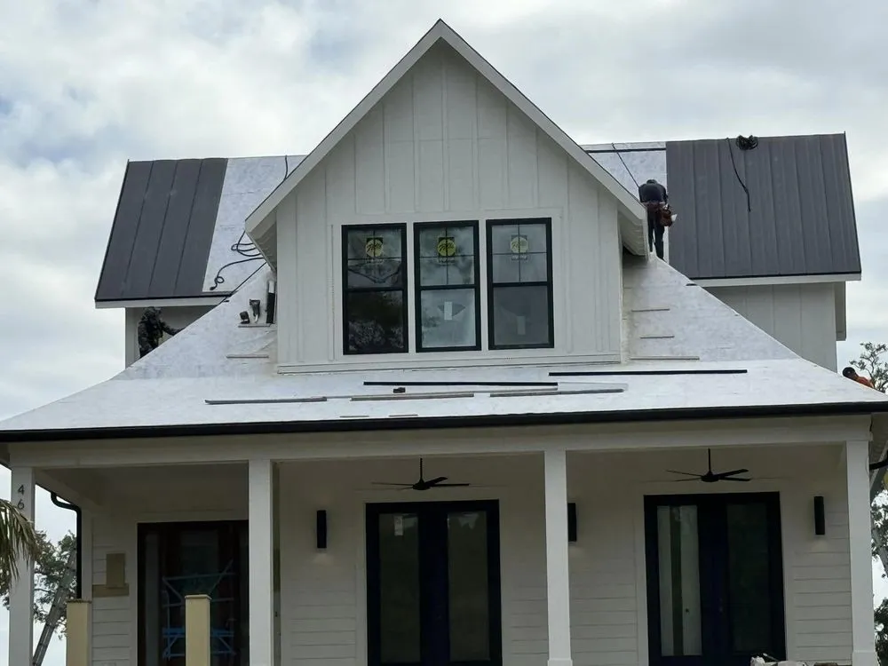 Slide of Woody's Roofing