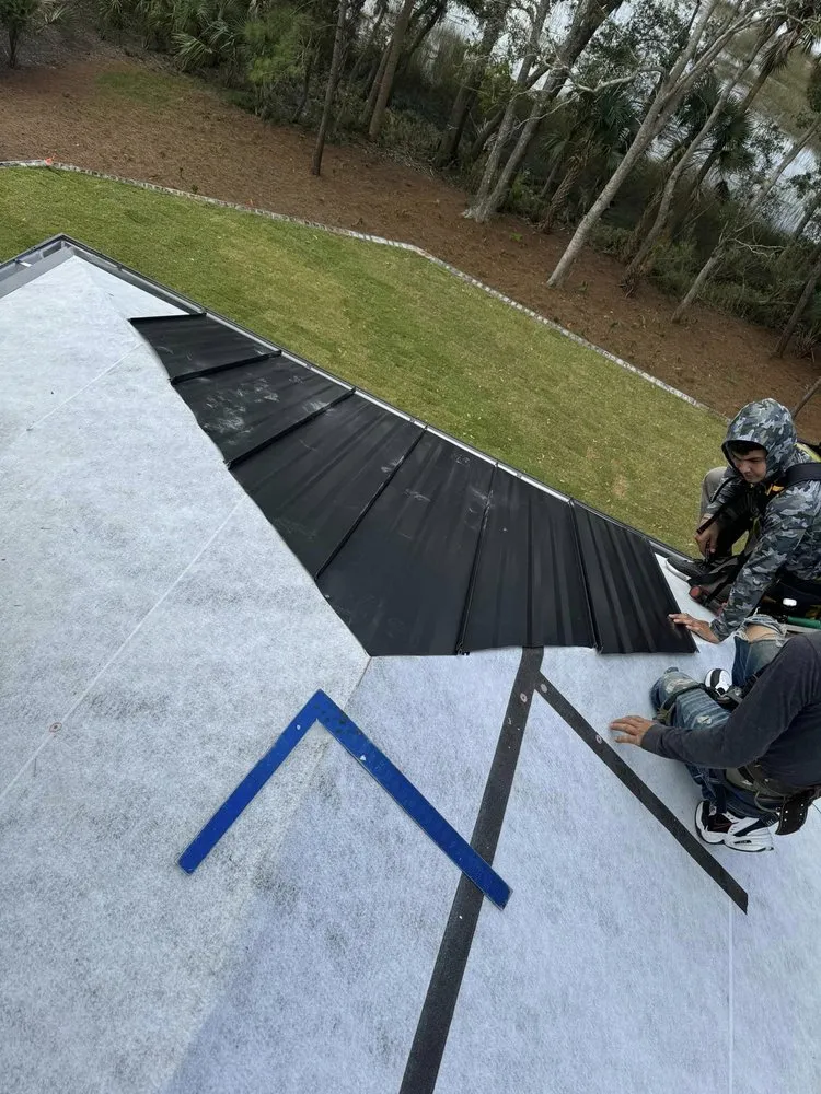 Slide of Woody's Roofing