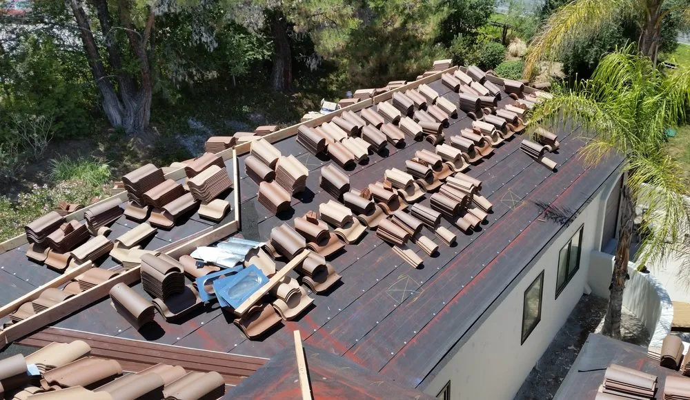 Slide of Woolbrights Roofing and Construction