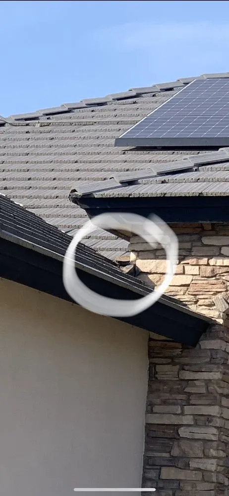 Slide of Woolf Roofing