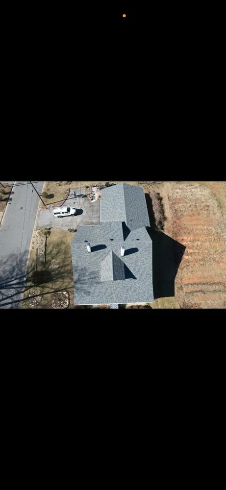 Slide of Woot Roofing