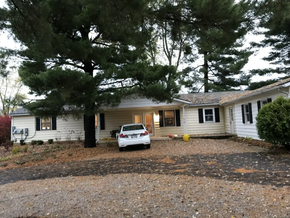 Slide of Working Class Roofing and Siding