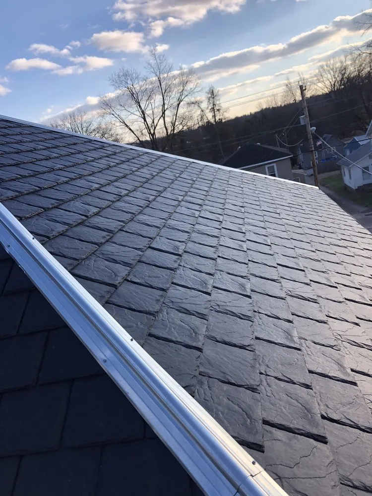 Slide of Working Class Roofing and Siding