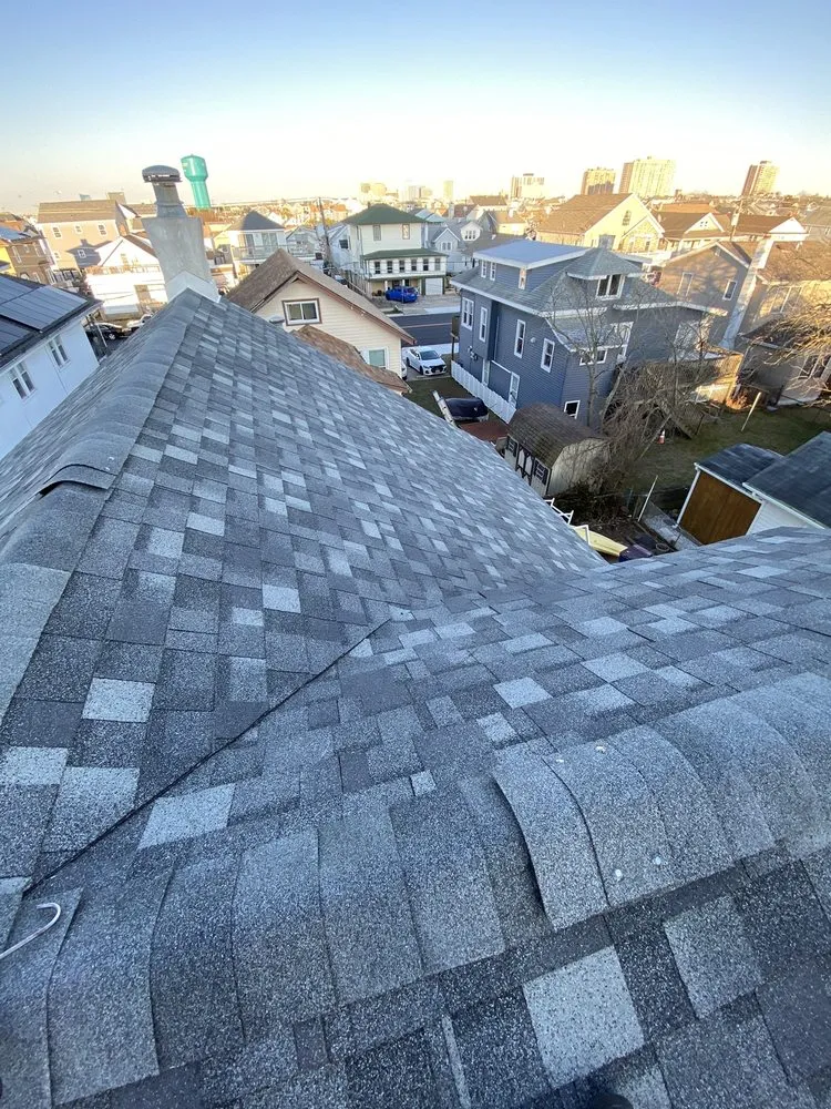 Slide of World Roofing