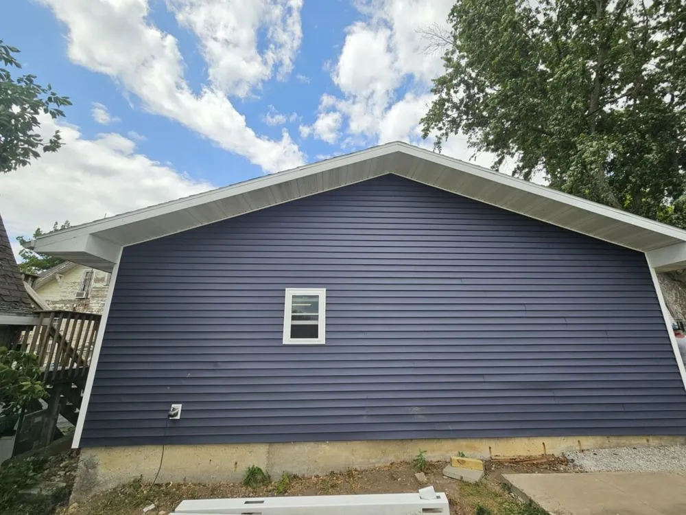 Top-rated storm damage roof repair in Reasnor, IA - World Wide Construction
