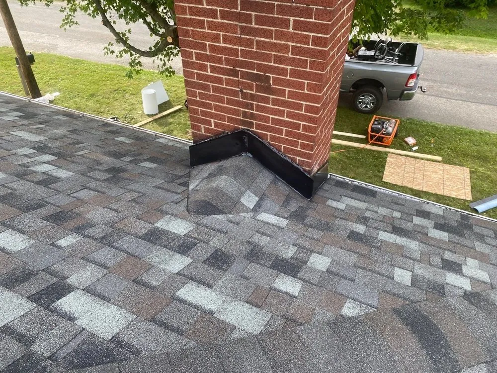 Slide of World’s Greatest Roofing