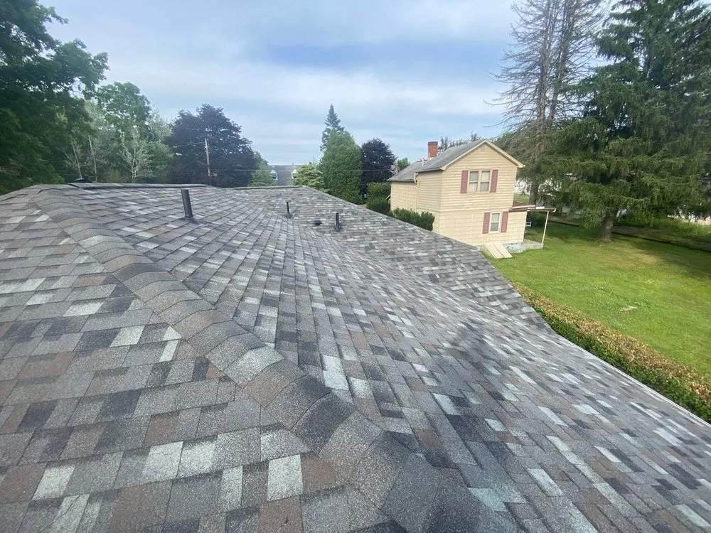 Slide of World’s Greatest Roofing