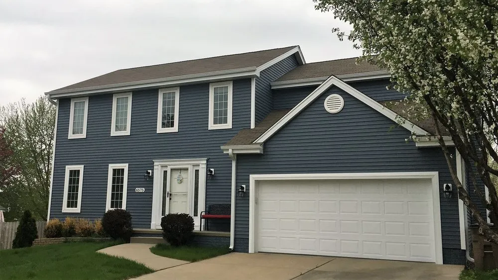 Expert shingle roofing service with free inspection across Cumming, IA - Worth Exteriors