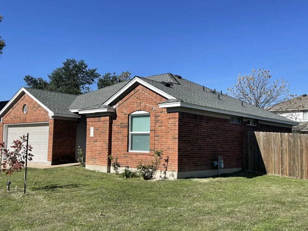 Slide of Wortham Brothers Roofing Austin