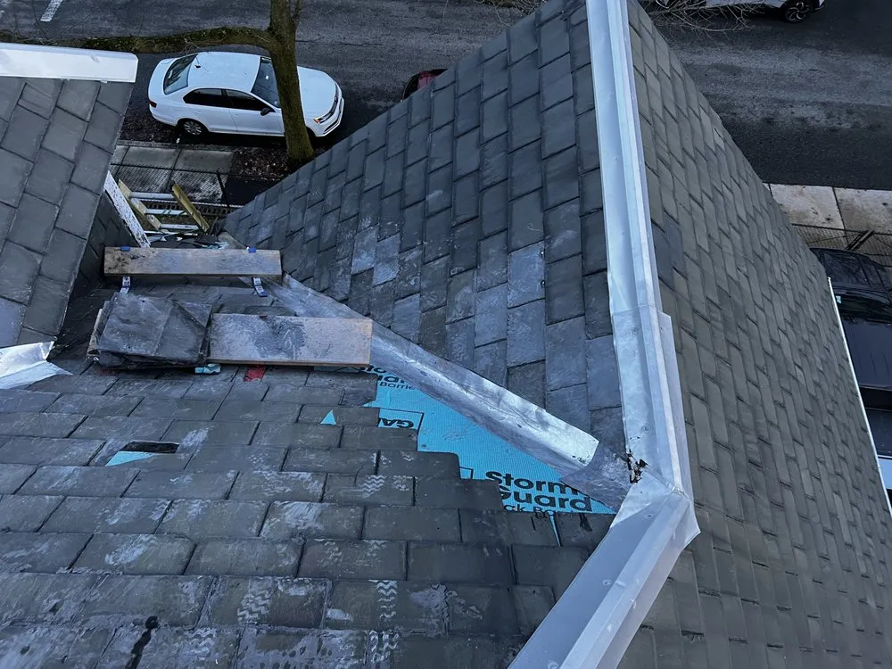 Slide of WRC Roofing Contractors