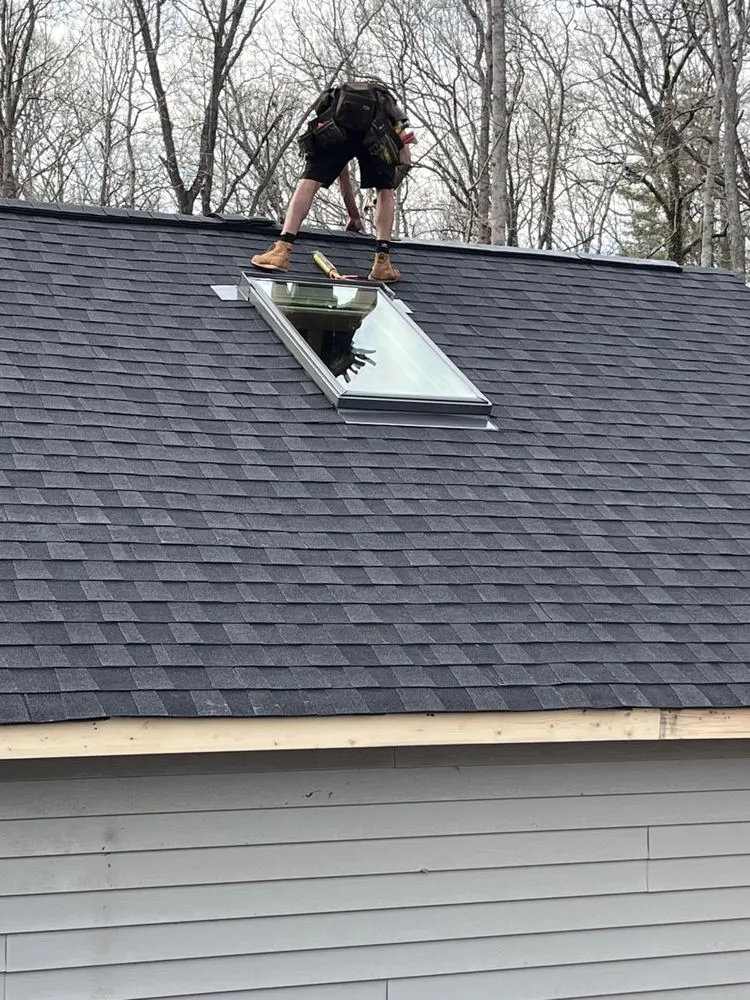 Slide of Wuilson’s Roofing