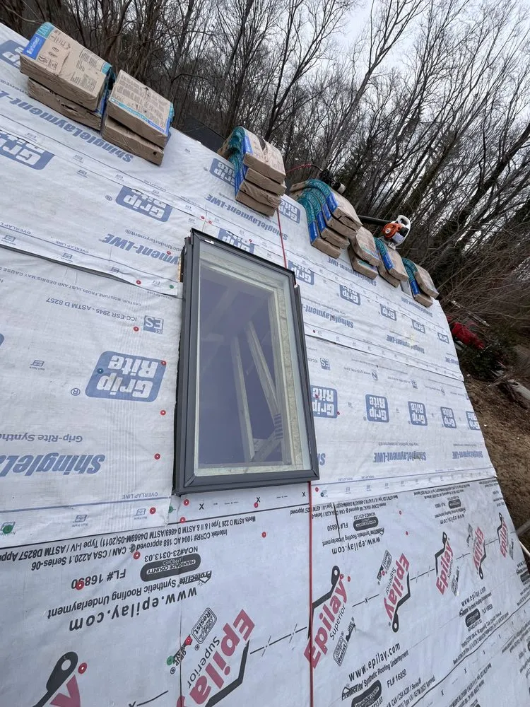 Slide of Wuilson’s Roofing