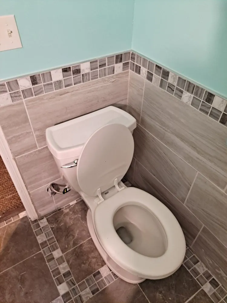 Slide of X Man Construction & Remodeling