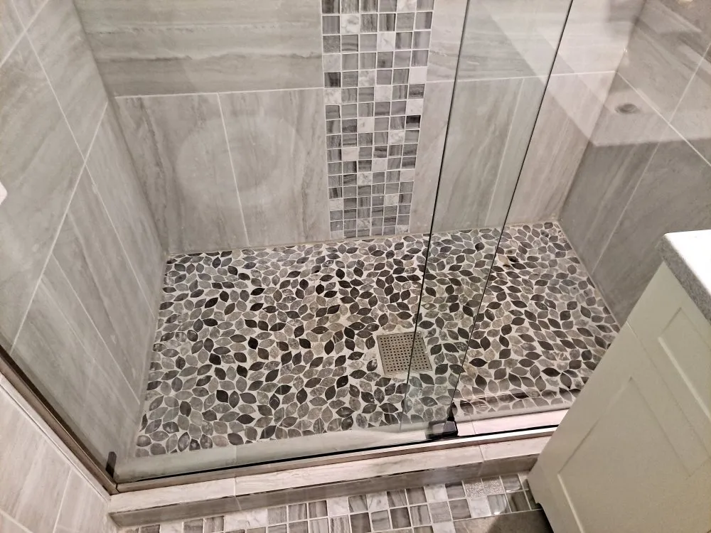 Slide of X Man Construction & Remodeling