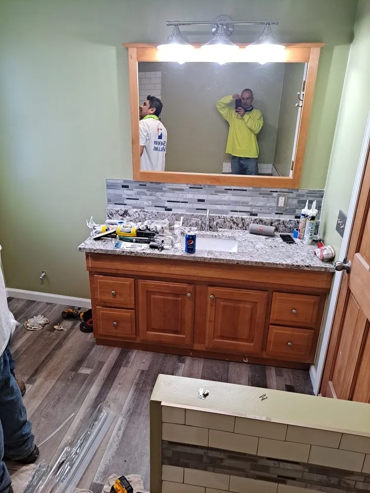 Slide of X Man Construction & Remodeling