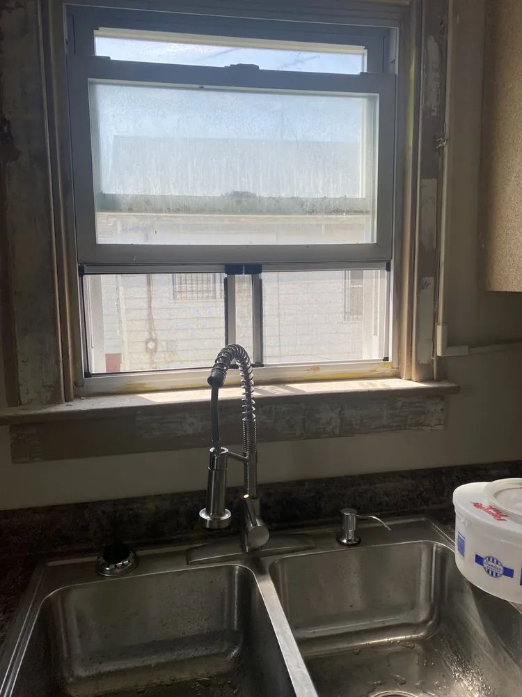 Slide of X Man Construction & Remodeling