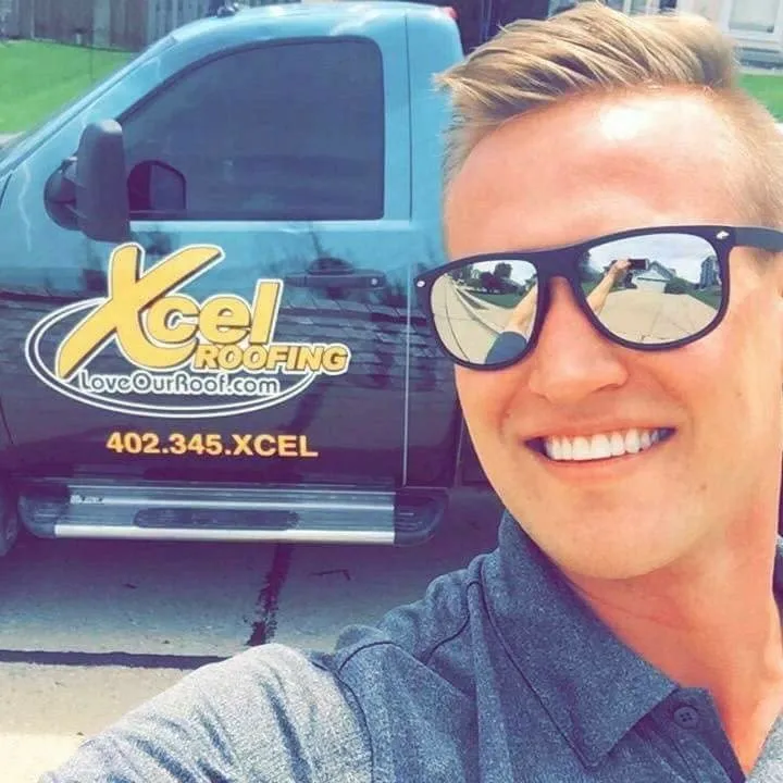 Slide of Xcel Roofing