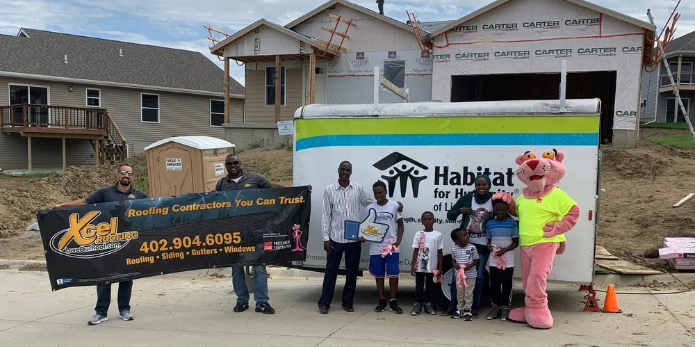 Slide of Xcel Roofing