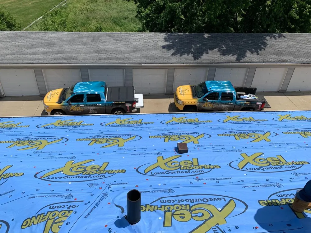 Slide of Xcel Roofing