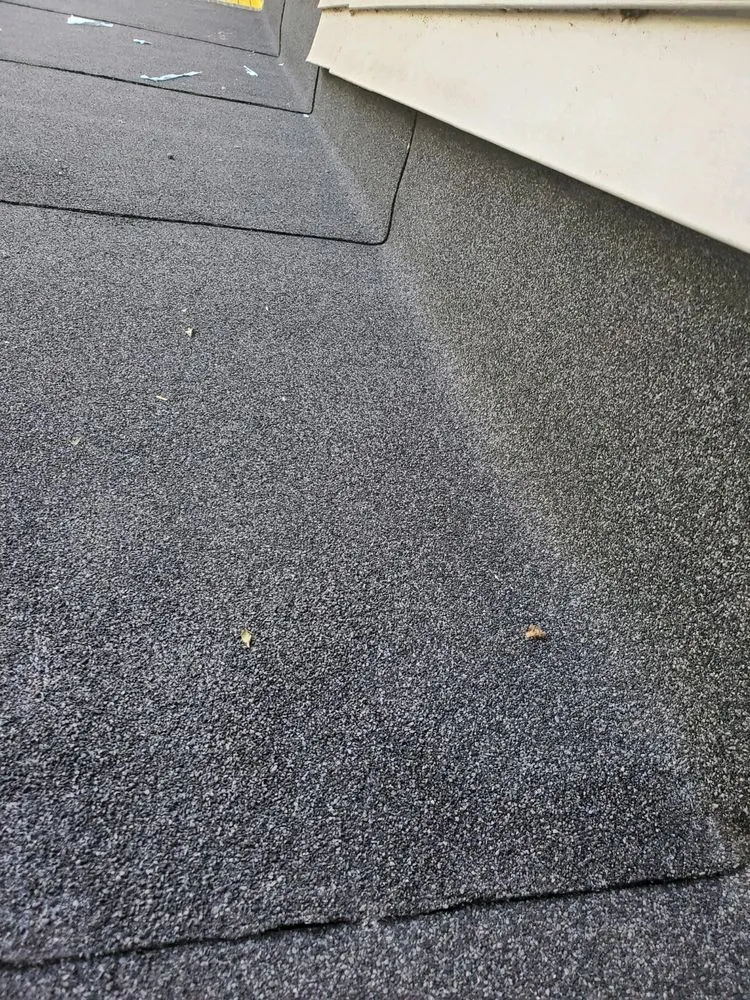 Slide of Xpert Roofing