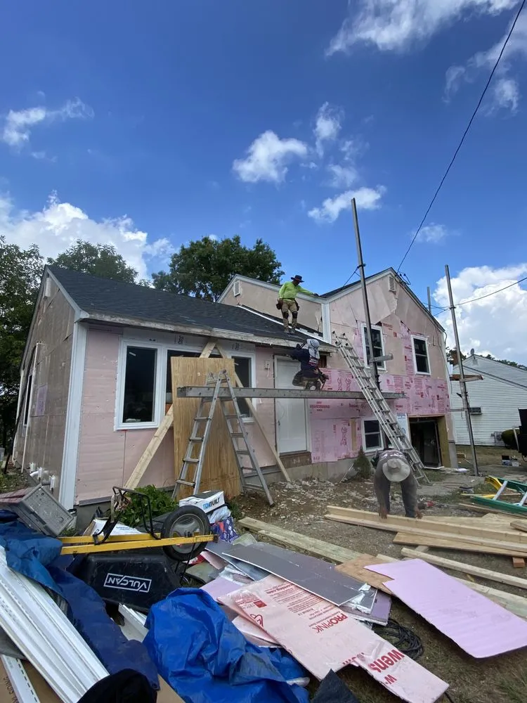 Slide of Xpress Builders Roofing & Siding