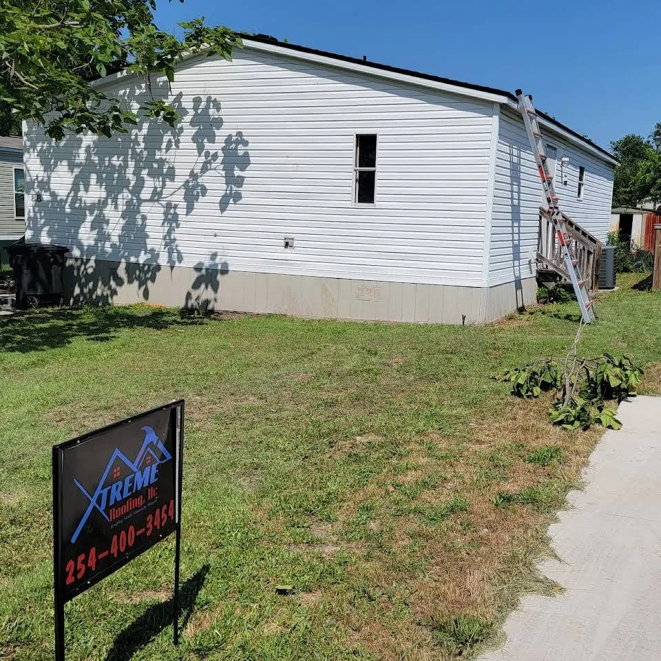 Slide of Xtreme Roofing