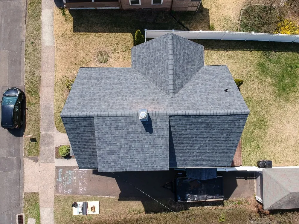 Slide of Yalesville Roofing