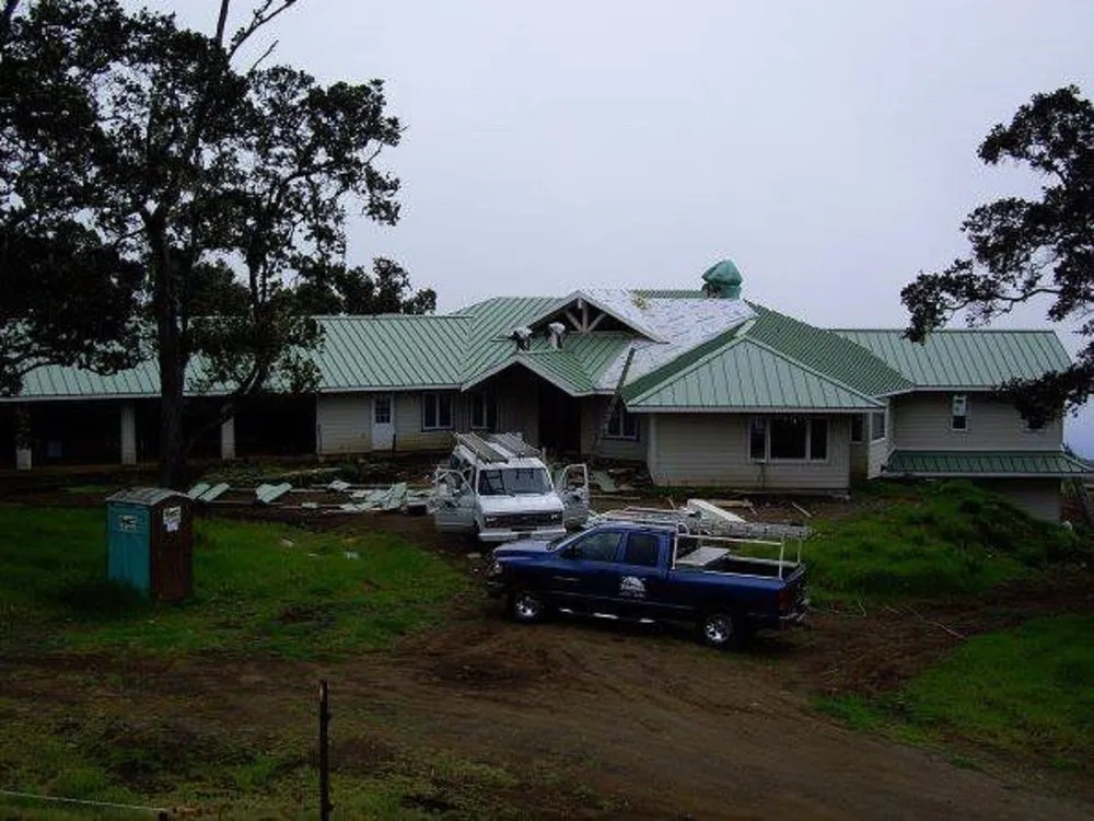 Slide of Yama's Roofing