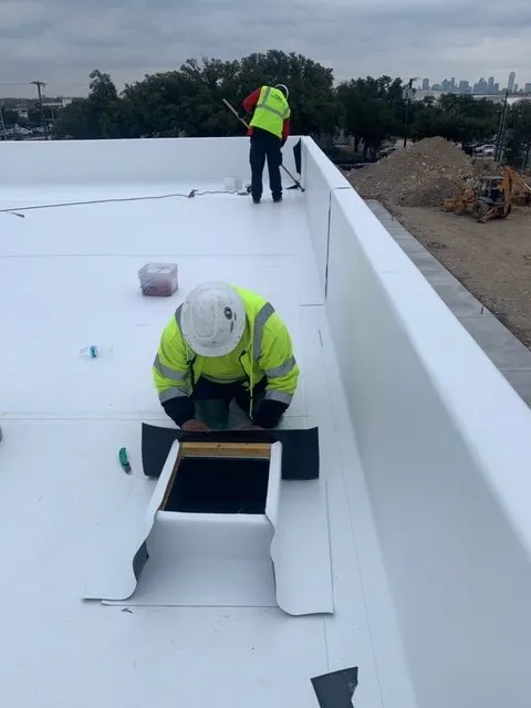 Slide of Yankees Roofing