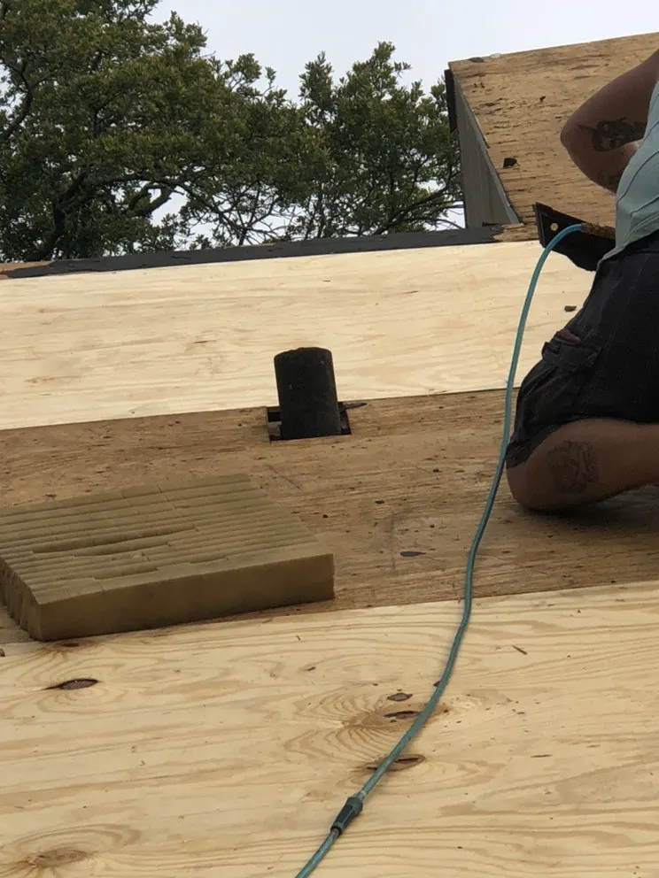 Slide of Yank's Roofing