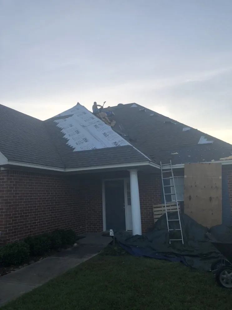 Slide of Yank's Roofing