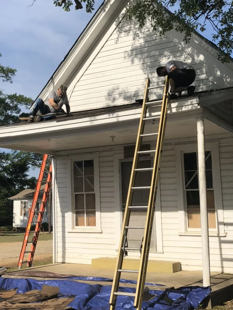 Slide of Yank's Roofing
