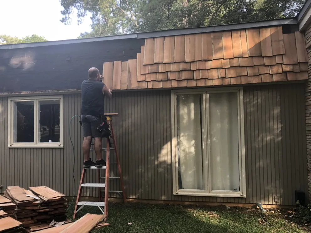 Slide of Yank's Roofing