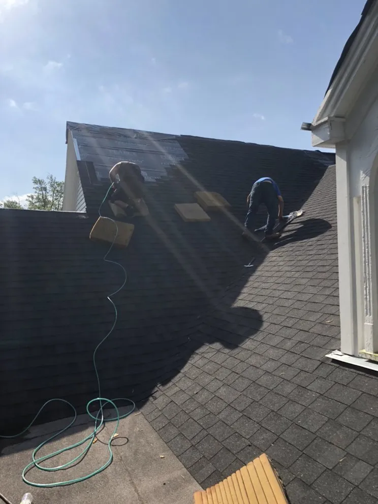 Slide of Yank's Roofing