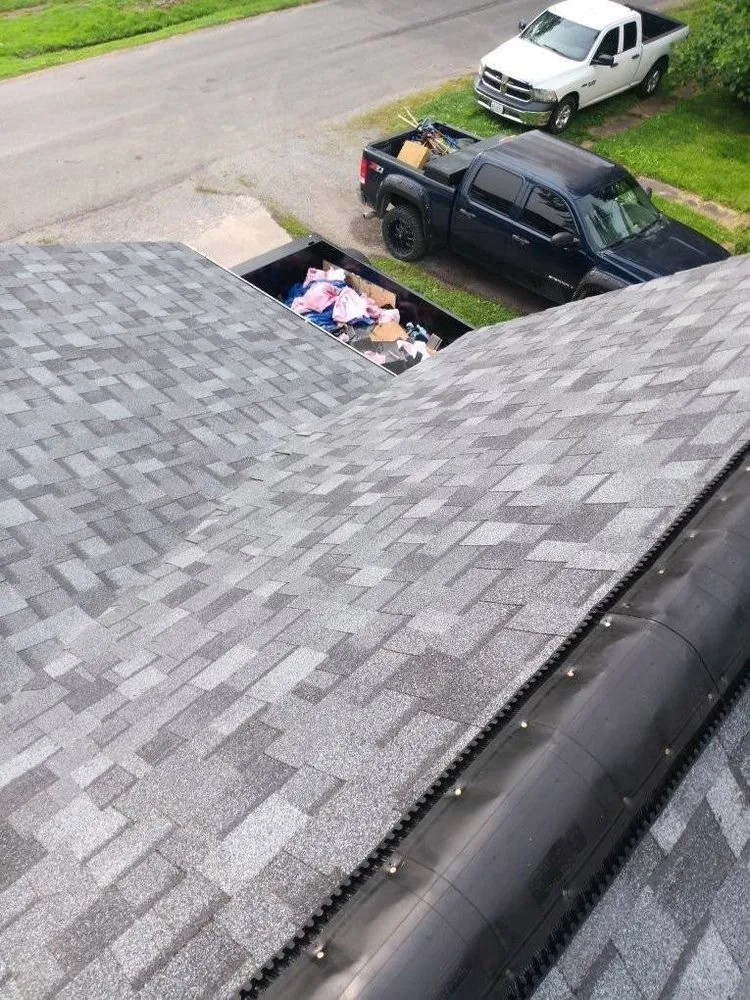 Slide of Yellow Duck Roofing