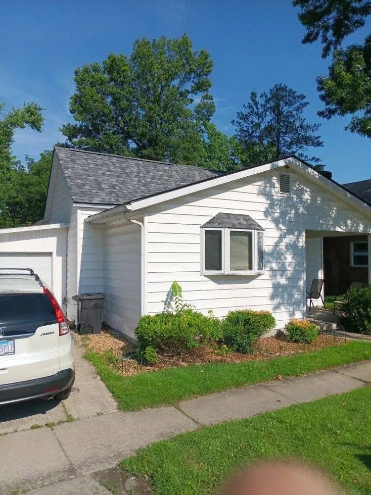 Slide of Yellow Duck Roofing