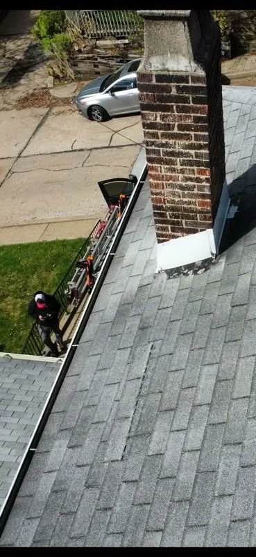 Slide of Yinzer Roofing and Contracting