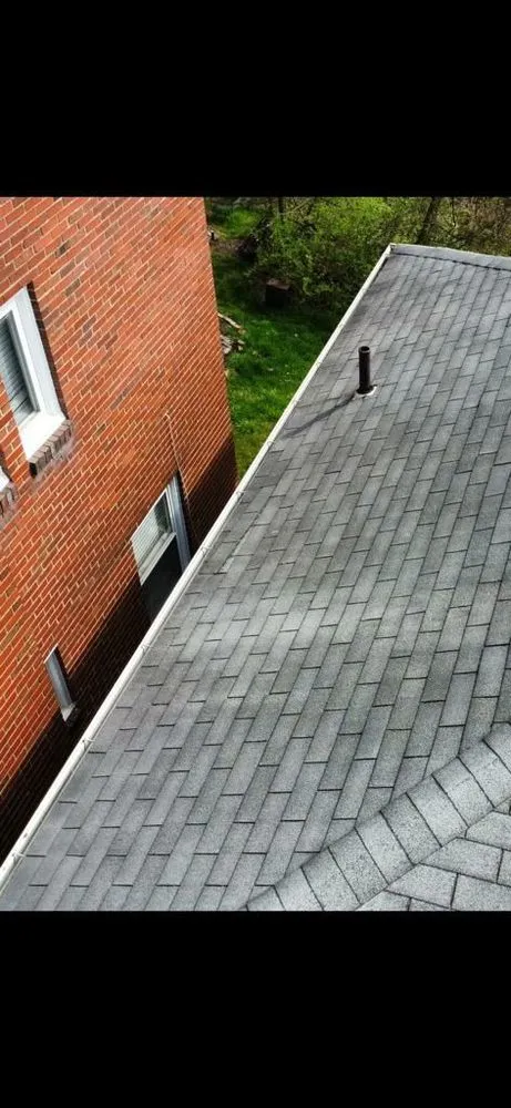 Slide of Yinzer Roofing and Contracting