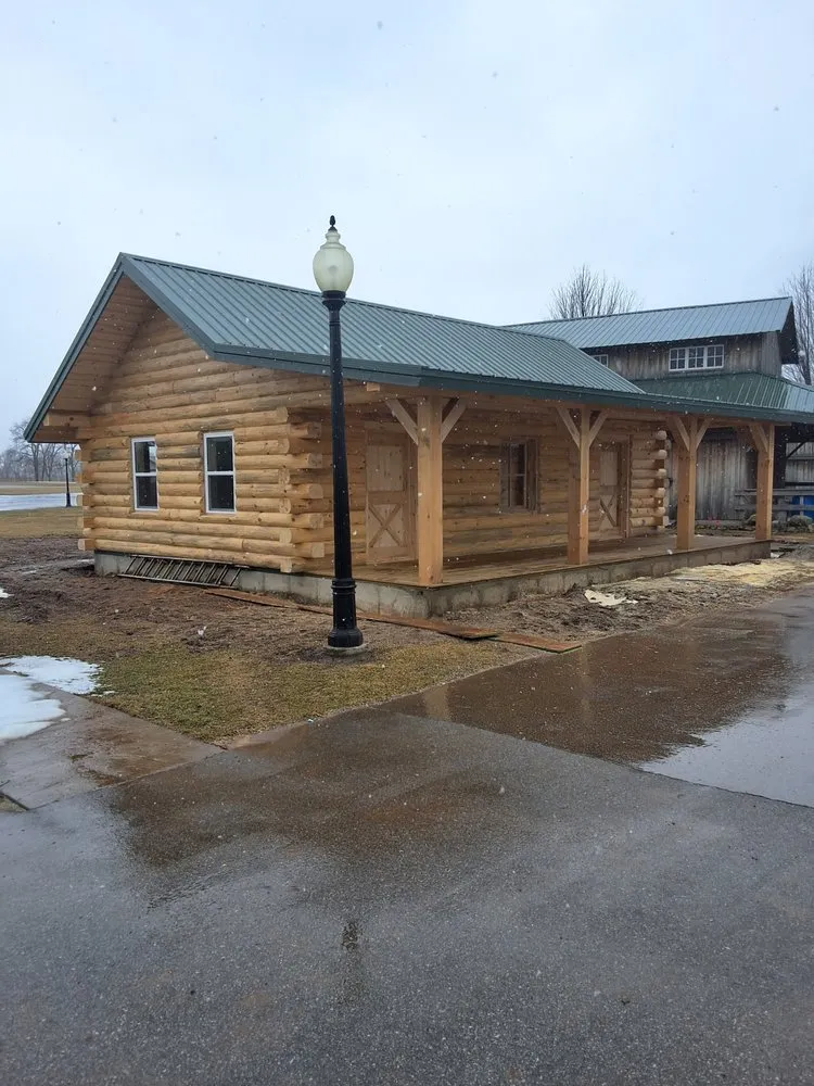 Slide of Yoder's Log & Timber Pro's