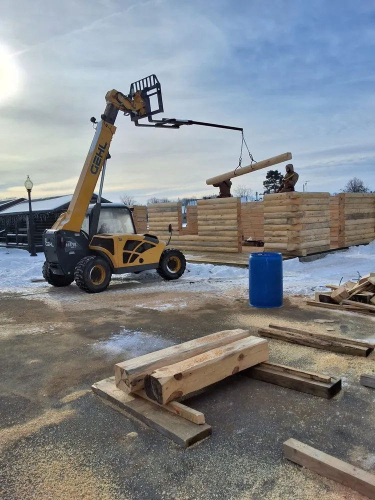 Slide of Yoder's Log & Timber Pro's