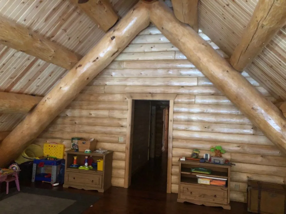 Slide of Yoder's Log & Timber Pro's