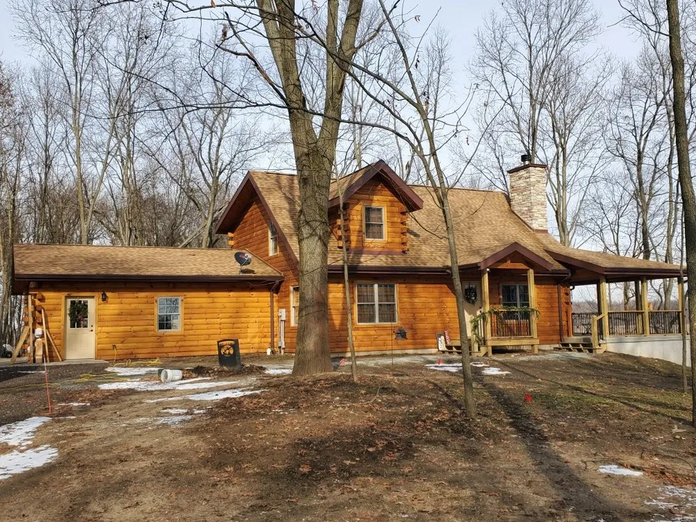 Slide of Yoder's Log & Timber Pro's