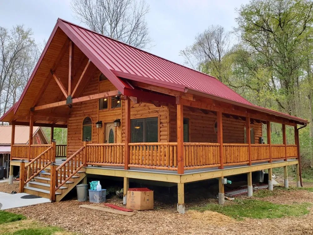 Slide of Yoder's Log & Timber Pro's