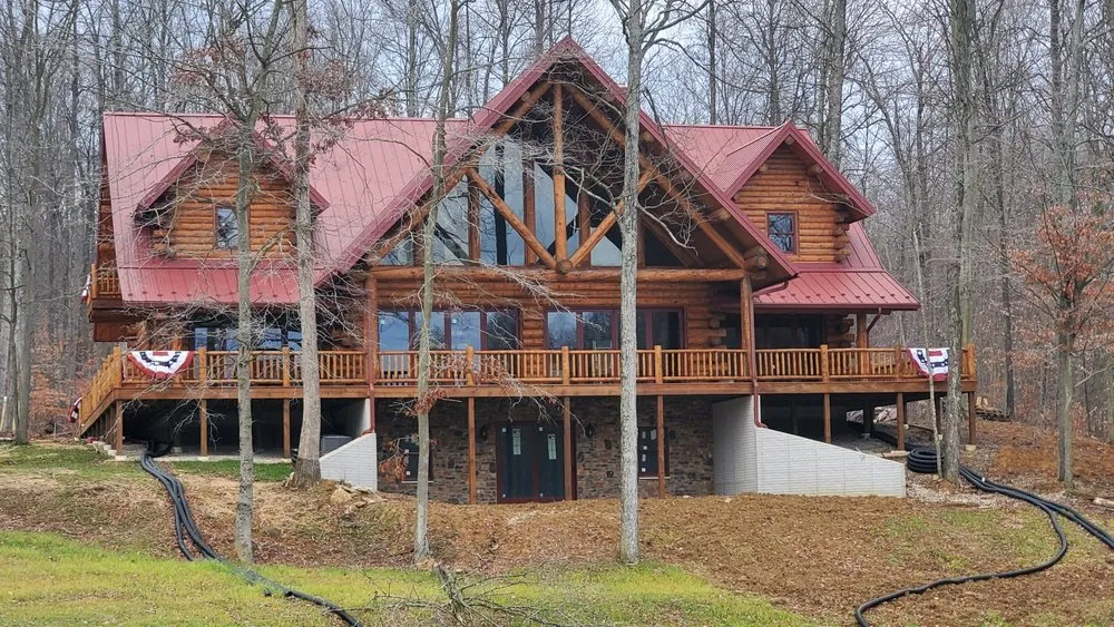 Slide of Yoder's Log & Timber Pro's