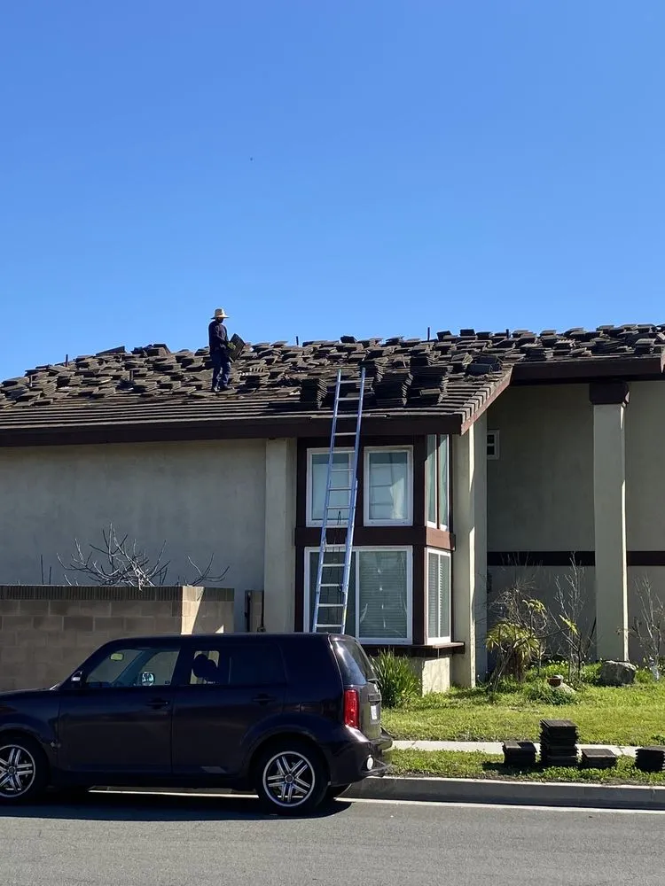 Slide of Yoshida Roofing Company