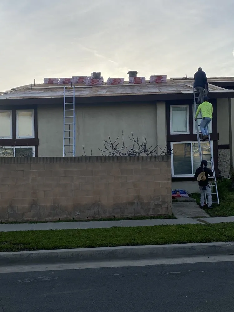 Slide of Yoshida Roofing Company