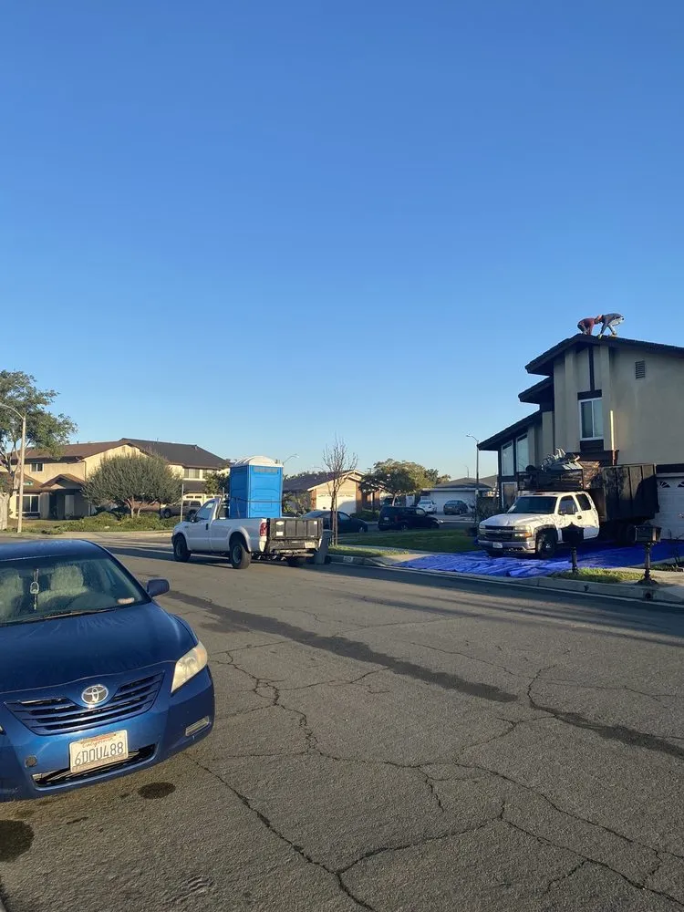 Slide of Yoshida Roofing Company