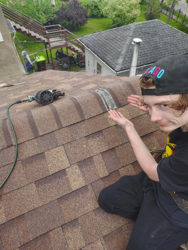 Slide of young roofing